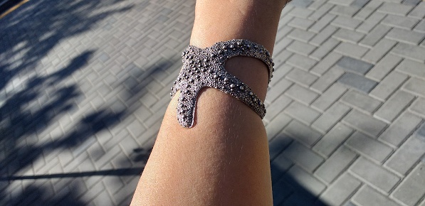 wrist bracelet in the shape of a starfish, jewelry