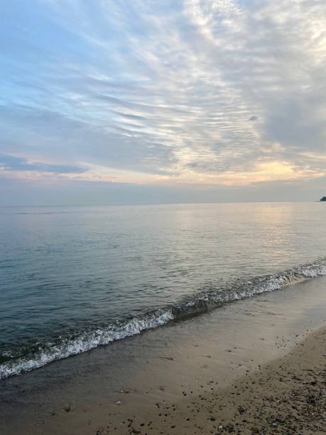 istock Cloudy morning sky at the beach 1686719975
