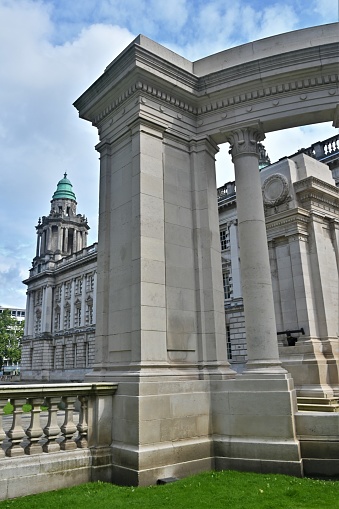 An exterior view of the impressive city hall building in the centre of Belfast in Northern Ireland.