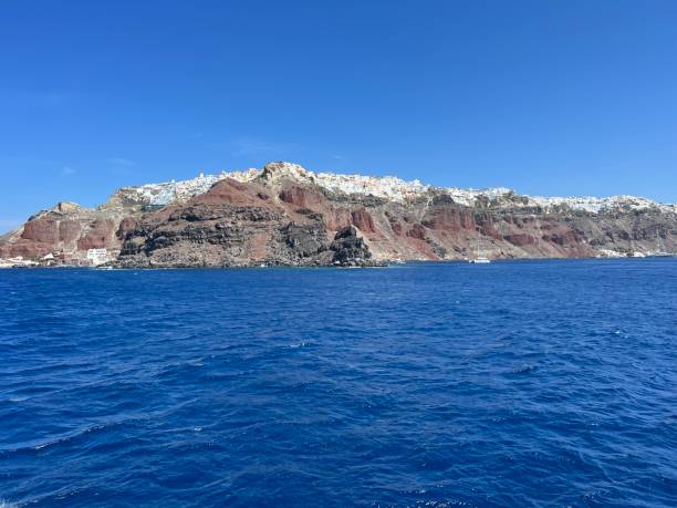 istock Oia town during the day, view from the sea 1686724325