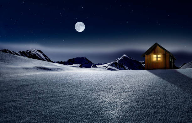 Christmas hut with lighted window in a snowy winter landscape