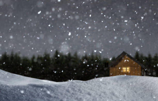 istock Christmas hut with lighted window in a snowy winter landscape 1686727015