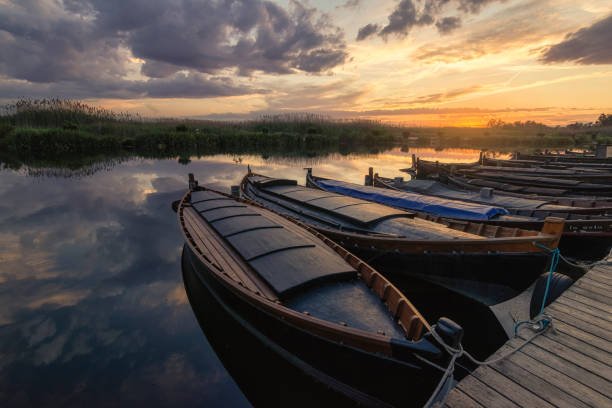 istock boats moored at the jetty at sunset 1686729911