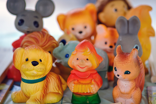 Plastic ussr toys for sale at a flea market, close up