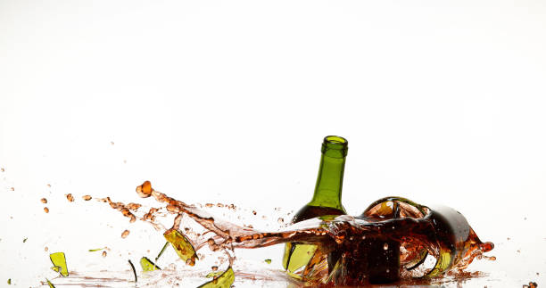 istock Bottle of Red Wine Breaking and Splashing against White Background 1686751025