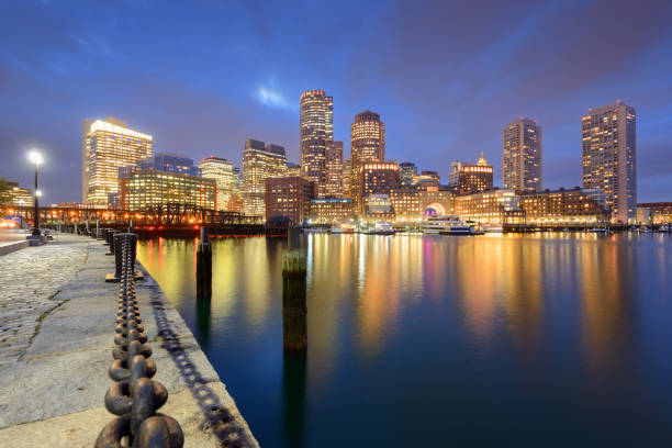 Boston, Massachusetts, USA Harbor and Cityscape Boston, Massachusetts, USA harbor and cityscape at dusk. boston harbor stock pictures, royalty-free photos & images