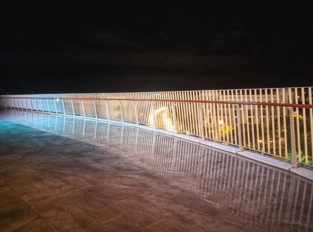 istock The entertainment area is surrounded by a fence at night. 1686768700