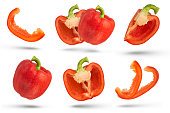 Set of paprikas on a white isolated background. Paprika in different ways of cutting.
