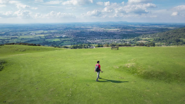 istock Backpack hiker on Cleeve Hill, Cheltenham, Gloucestershire, England, Summer daytime 1686787581
