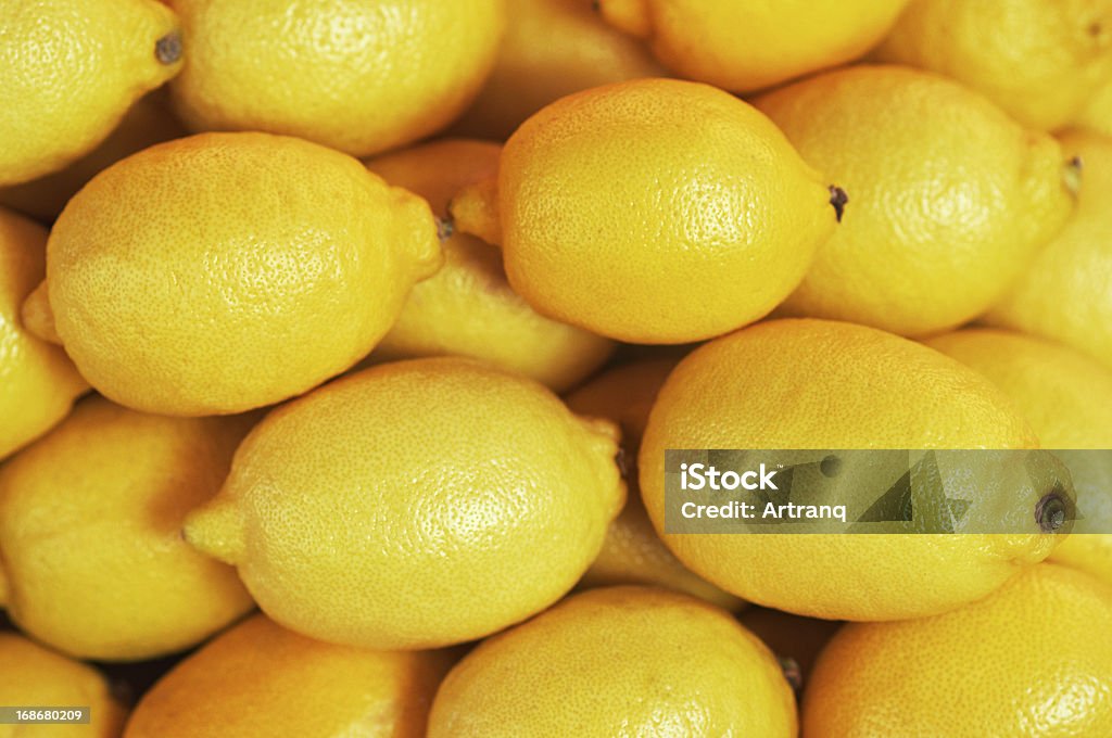 Fond, texture de nombreux citrons du marché - Photo de Agrume libre de droits