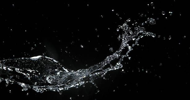 istock Water spurting out against Black Background 1686810550