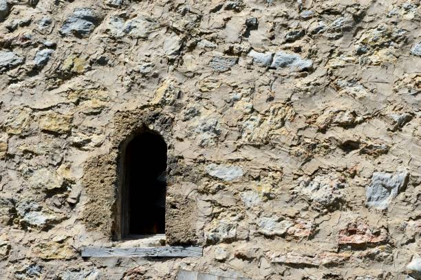 istock small window on the stone church 1686828626