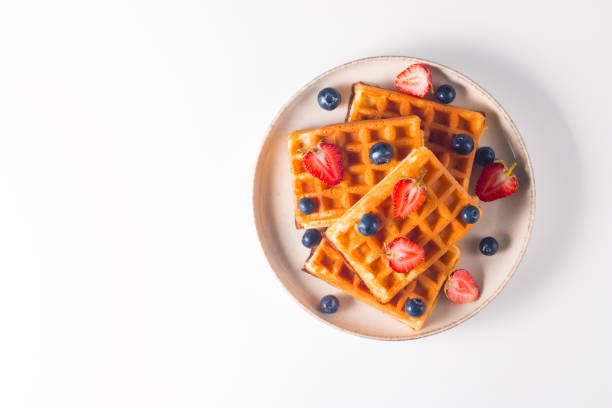 istock Belgian waffles for breakfast. Dessert food concept. 1686862844