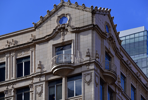 Seattle, King County, Washington state, United States: Melbourne Tower (1927), detail of the top floor, balcony and ornate façade, historic Beaux-Arts office building - Architects Lawton and Moldenhour; George Willis Lawton; Herman Alfred Moldenhour - 3rd Ave, Central Business District.