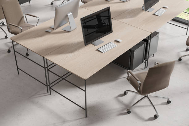 istock Top view of office workspace interior with pc computers and chairs in row 1686875058
