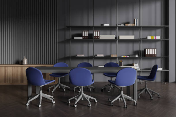 istock Gray board room interior with bookshelves 1686899498