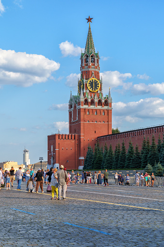 Russia, Moscow, July 17,2023:People walk around Red Square, , the Spasskaya Tower and the Kremlin are visible, which are world-famous historical sites of Moscow
