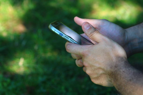 istock A male hand dealing with a smartphone 1686937330