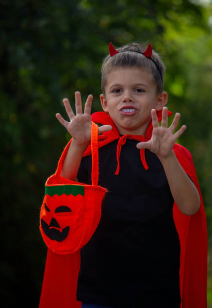istock boy dressed in a halloween costume. 1686949060