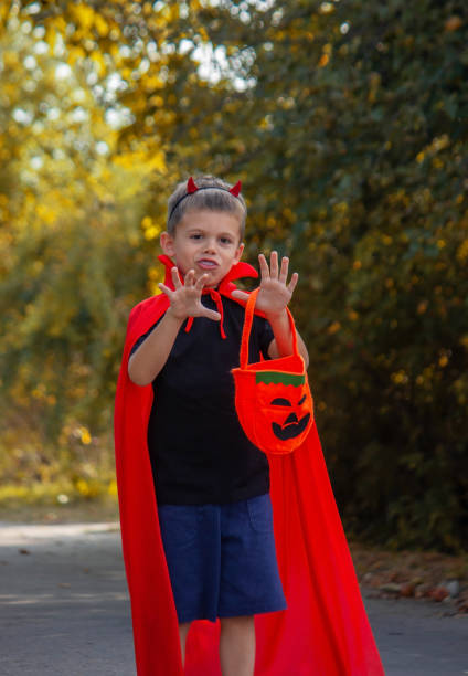 istock boy dressed in a halloween costume. 1686949061