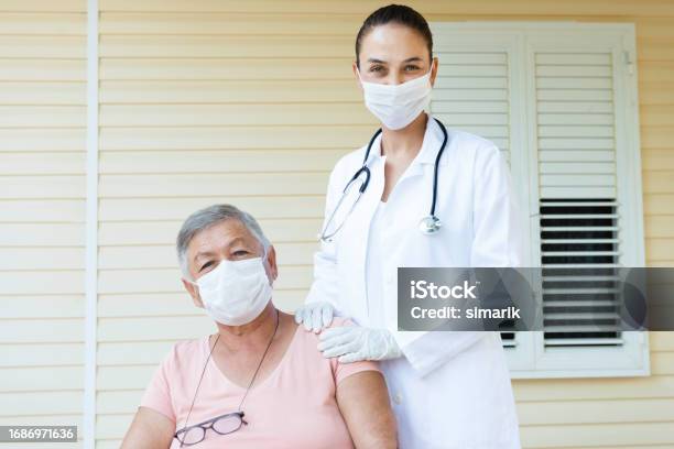 Vaccination Stock Photo - Download Image Now - 70-79 Years, 80-89 Years, A Helping Hand