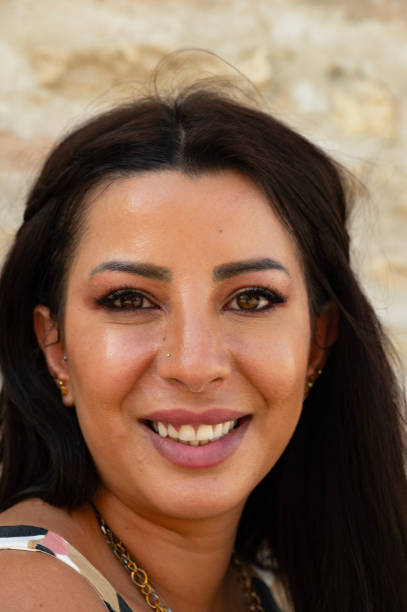 Close up of a beautiful middle eastern lady photographed on a street in Bukhara, Uzbekistan