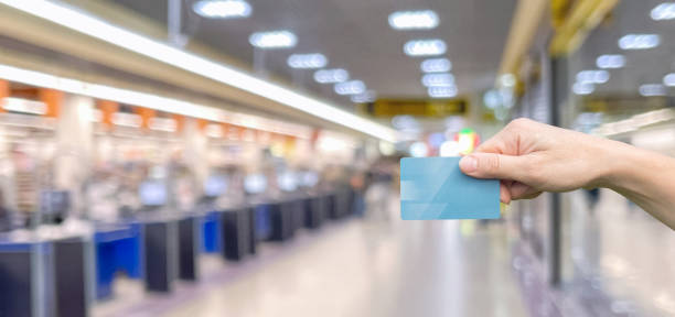 istock Hand-holding card for shopping online. 1686998031