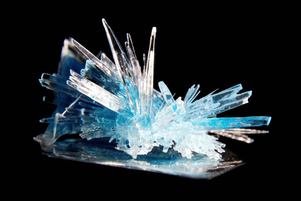 istock Shiny blue quartz crystal closeup view isolated on black background 1687023383
