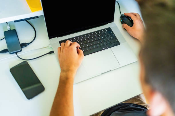 istock 20 years old man working from home 1687038405