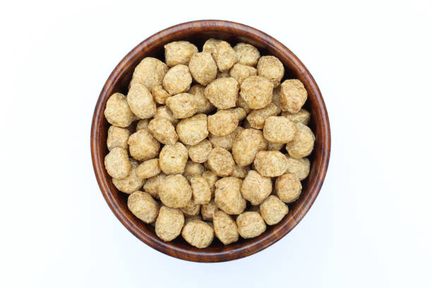 istock Soya chunks in a wooden bowl top view 1687039184