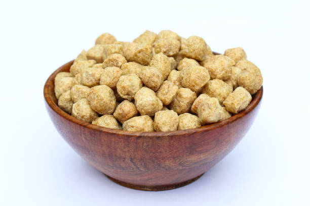 istock Soya chunks in a wooden bowl close-up view 1687039511