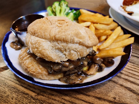 Mushroom burger with potato chips fries at glasgow Scotland england uk