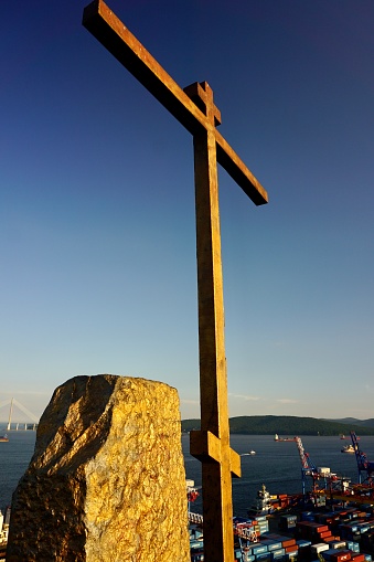 The cross on the hill. The cross on the Krestovaya Hill in Vladivostok. The cross on the mountain during sunset.