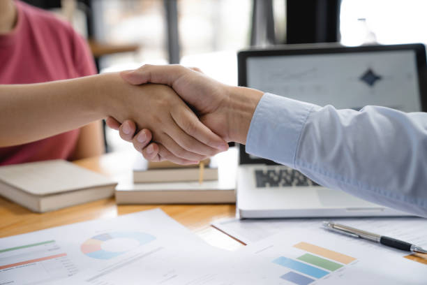 istock Teamwork executives colleagues business people handshake after meeting. 1687111084