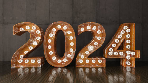 istock 2024 Bulb Sign Against Black Wall 1687114260