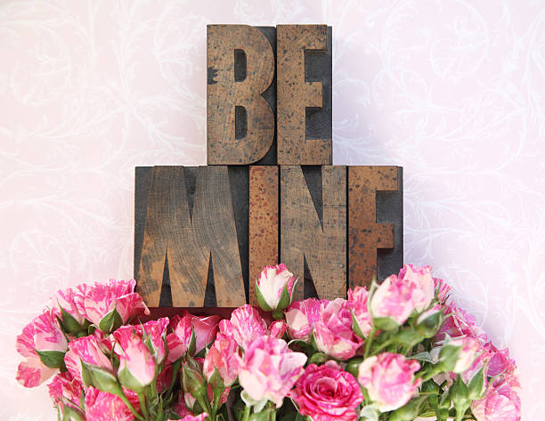 istock wood type be mine and little roses 168712436