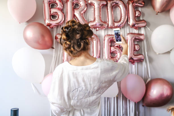 istock Young bride begins preparations on the wedding morning 1687149907