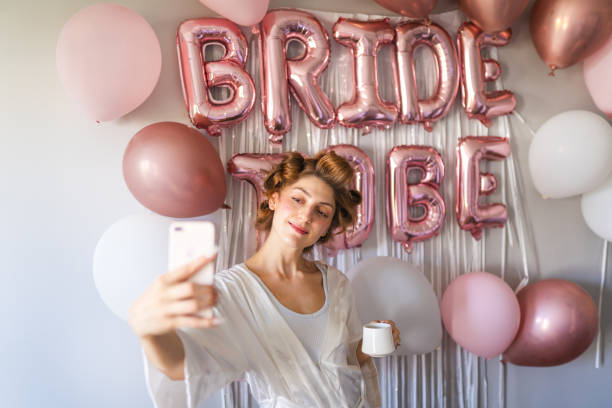 istock Young bride begins preparations on the wedding morning 1687149925