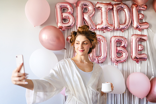 Young bride begins preparations on the wedding morning