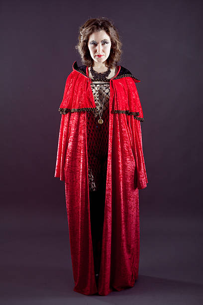 istock Young women in red long raincoat 168716439