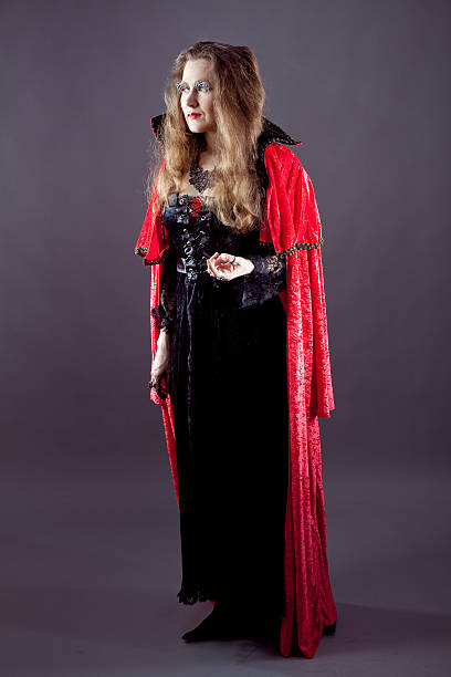 istock Young women in red long raincoat 168716511