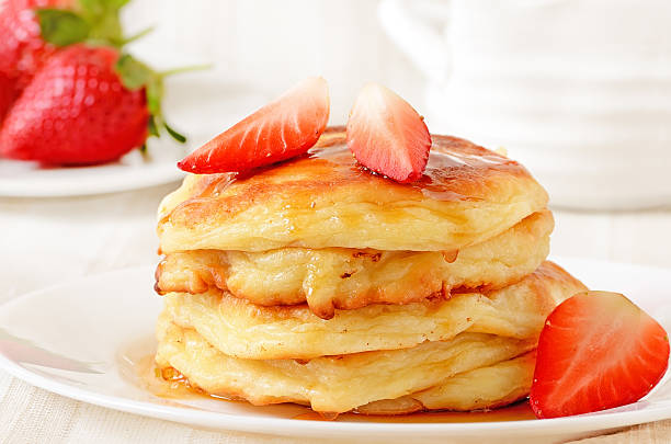 istock Homemade cheese pancakes and strawberries 168716978