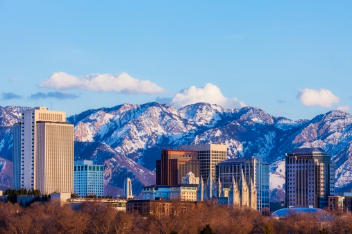 Skyline of Salt Lake City, Utah, USA in early spring as the sun sets.