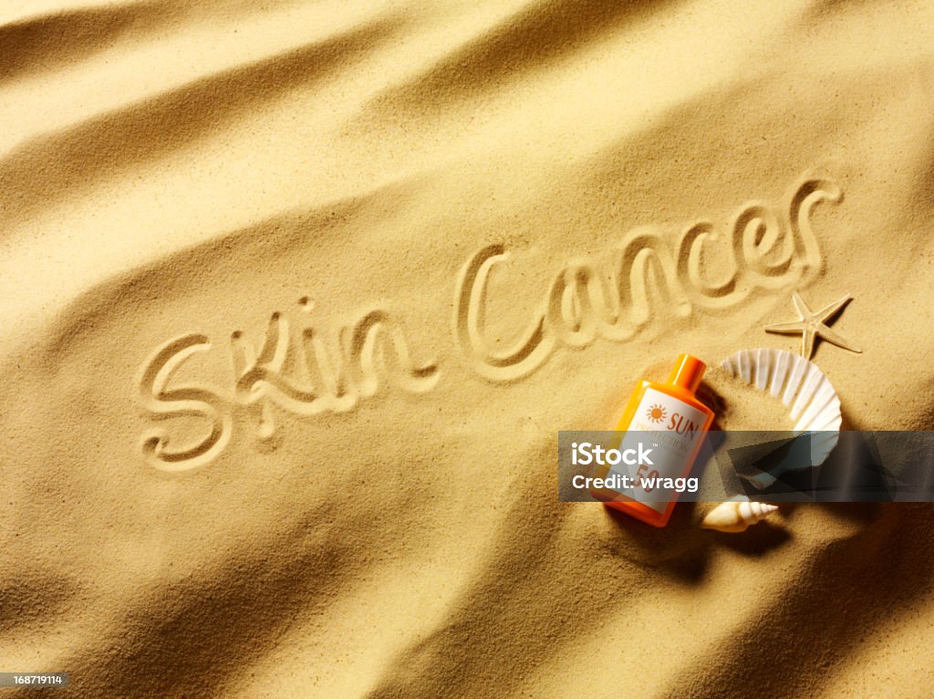 Câncer de pele e proteção solar - Foto de stock de Areia royalty-free