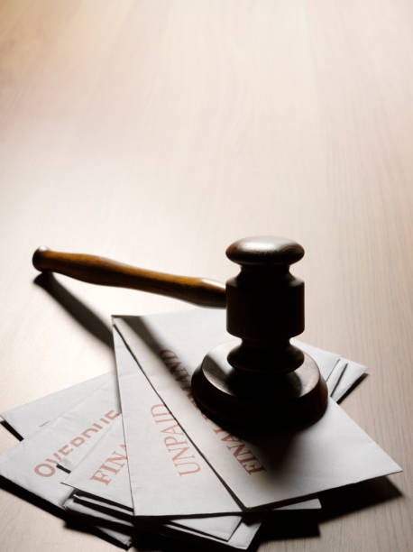 istock Debt on a Desk and Gavel 168719670