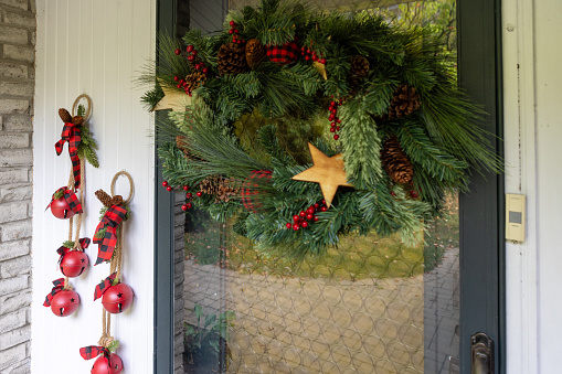Christmas decorations on a door of a Canadian home