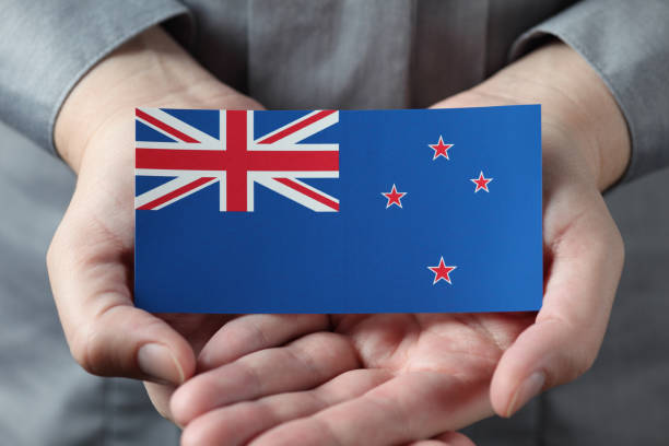 istock New Zealand flag in palms 168721112