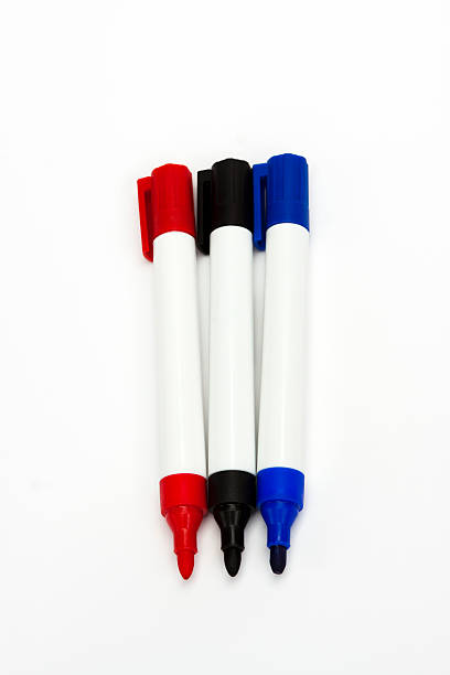 istock Whiteboard markers red, black and blue against white background 168721414