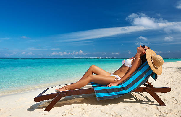 istock Young woman at beach 168722895