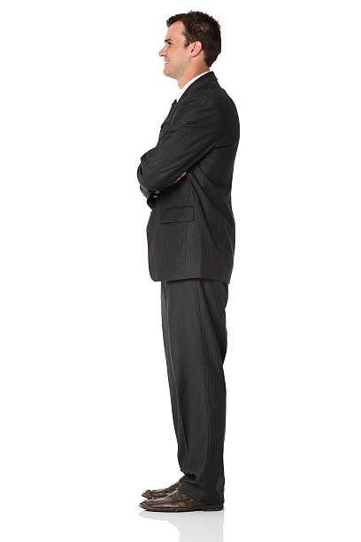 istock Businessman standing with his arms crossed and smiling 168723355